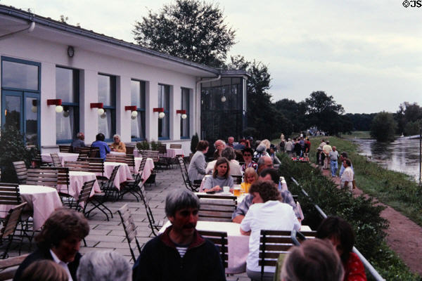 Kornhaus Restaurant on the Elbe (1929-30) outdoor patio. Dessau, Germany. Style: Bauhaus. Architect: Karl Fieger.