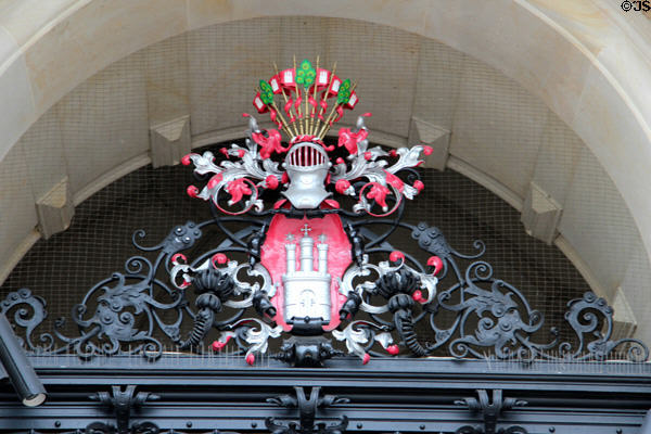Ornate grillwork & Hamburg Coat-of-Arms on Hamburg City Hall. Hamburg, Germany.