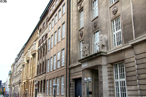 Ornate facades of buildings lining Alter Wall. Hamburg, Germany.