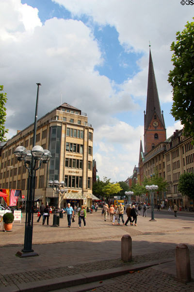 Pedestrian zone near City Hall with St Peter's Church in background. Hamburg, Germany.
