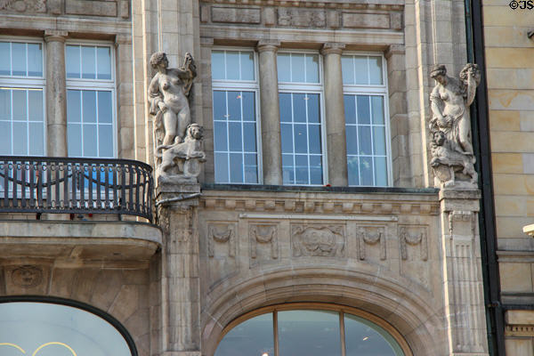 Statuary on façade of Alsterhaus department store on Jungfernstieg. Hamburg, Germany.