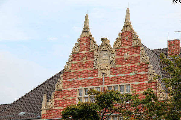 Neo-baroque gable on Hanseatic brickwork style university building (1905) on Holstenwall. Hamburg, Germany.