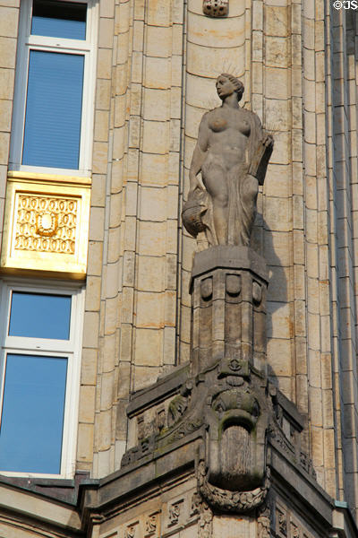 Statue on Deutsche Bank building at Mönckebergstraße U-Bahn station. Hamburg, Germany.