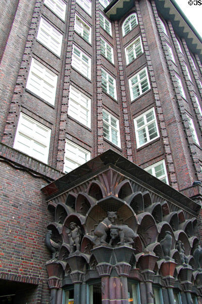 Details of statuary capping entrance level of Chilehaus. Hamburg, Germany.