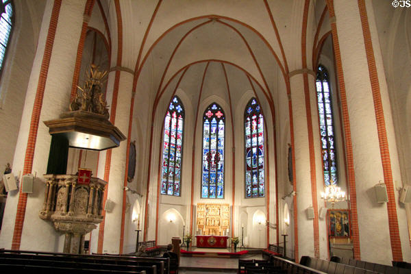 Pulpit, altar & stained glass windows depicting the important events of the ecclesiastical (mid-20thC) by Charles Crodel in St. Jacobi Church. Hamburg, Germany.