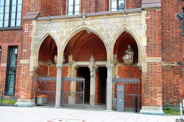 Entrance to St Peter's Church with statues of St Peter & Evangelist St John. Hamburg, Germany.