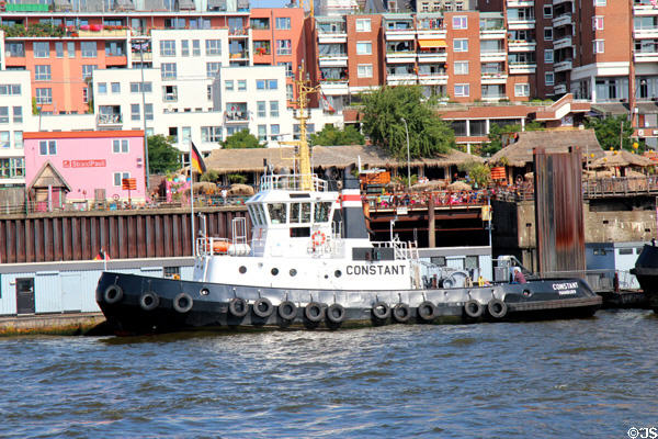 Tug boat, Constant (1987), in Hamburg harbor. Hamburg, Germany.
