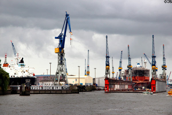 Elbe River shipyard against a cloudy sky. Hamburg, Germany.