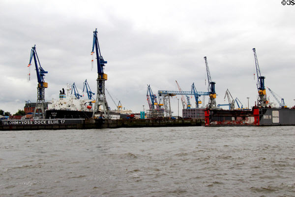 Drydock & cranes as seen from Elbe River. Hamburg, Germany.