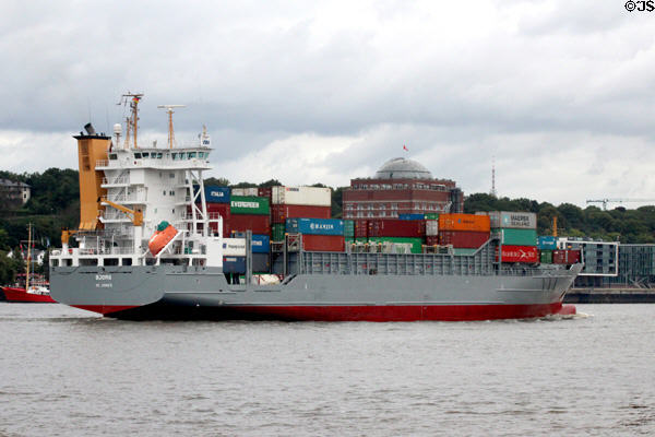 Container ship, Bjorg, St. John's, with life boat & slide, traveling along Elbe River. Hamburg, Germany.
