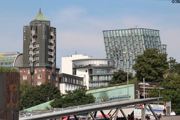 Hotel Hafen Hamburg tower (1987) & Tanzende Türme (2012) on hill above St. Pauli Pier. Hamburg, Germany.