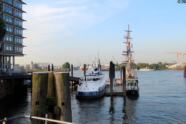 Boats moored on Elbe River at HafenCity district. Hamburg, Germany.
