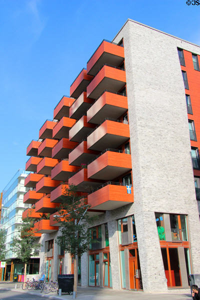 Modern residential building at Am Dalmannkai 12-16 with shops at street level in HafenCity. Hamburg, Germany.