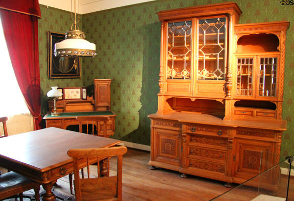 Sitting room in historicism style (c1888) from Viennese furniture factory including sideboard, table & desk at Hamburg History Museum. Hamburg, Germany.