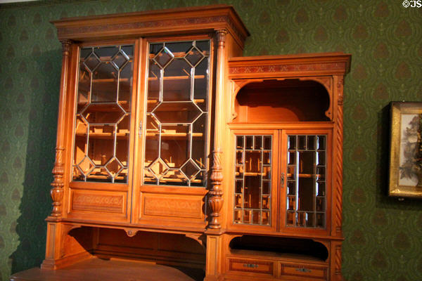Sideboard with paned glass doors on cupboards (c1888) from Viennese furniture factory at Hamburg History Museum. Hamburg, Germany.