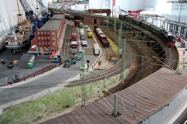 Elevated tracks, trains, ships & vehicles on model railway at Hamburg History Museum. Hamburg, Germany.