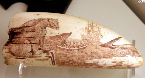 Scrimshaw engraving of whalers pursuing a whale with polar bear in foreground at International Maritime Museum. Hamburg, Germany.