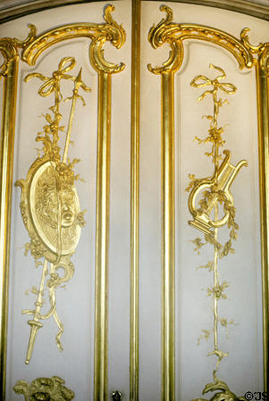 Roccoco doors with musical instruments in Sanssouci Palace. Potsdam, Germany.
