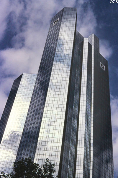 Deutche Bank twin towers (1984), 38 & 40 stories in irregular trapezoidal shape, in Mainzer Landstrasse area, Westend Sud District. Frankfurt am Main, Germany. Architect: Walter Hanig, Heinz Scheid, Johannes Schmidt.