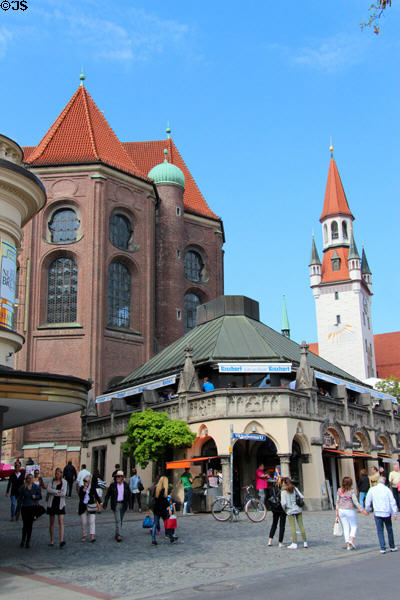 Churches & cafes at Viktualienmarkt. Munich, Germany.