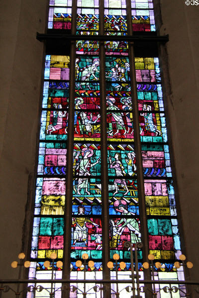Modern stained glass window at Frauenkirche. Munich, Germany.