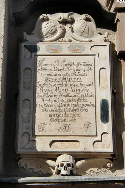 Tombstones (c1649) affixed to exterior of Peterskirche. Munich, Germany.