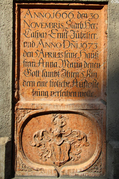 Tombstones (c1673) affixed to exterior of Peterskirche. Munich, Germany.