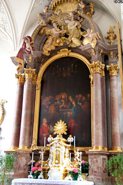 Altar with Last Supper painting at Peterskirche. Munich, Germany.