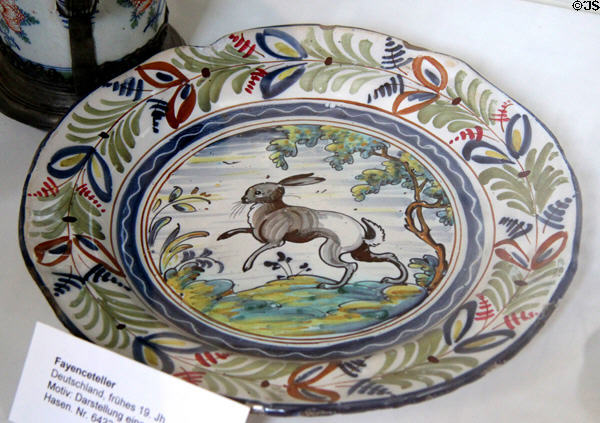 German faience plate (early 19thC) painted with leaping rabbit at German Hunting & Fishing Museum. Munich, Germany.