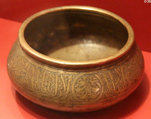 Muslim engraved brass basin (1st half 14thC) from Syria or Egypt at Five Continents Museum. Munich, Germany.