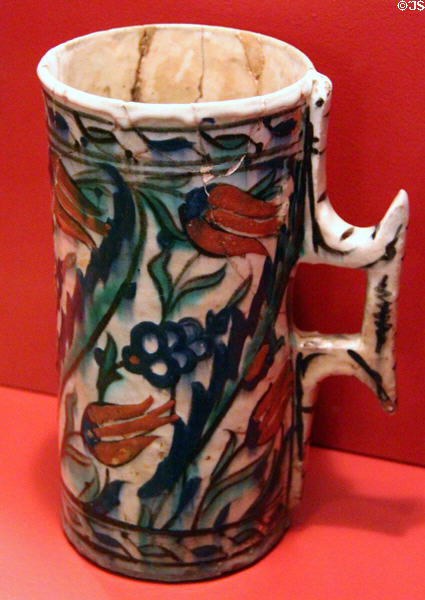 Ceramic mug painted with flowers (17thC) from Iznik, Turkey at Five Continents Museum. Munich, Germany.