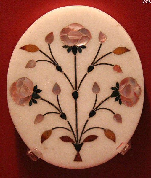 Mother of pearl inlaid marble plate with floral design (17thC) from Agra, India at Five Continents Museum. Munich, Germany.