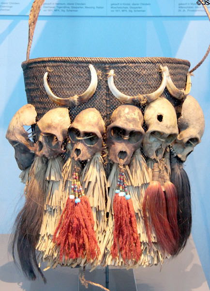 Carrying basket decorated with monkey skulls (prior 1911) of Naga people of Assam on Indo-Burma border at Five Continents Museum. Munich, Germany.