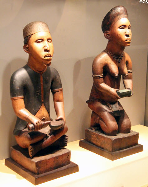 Pair of figure wood carvings (early 20thC) from Yombe culture of Democratic Republic of Congo at Five Continents Museum. Munich, Germany.
