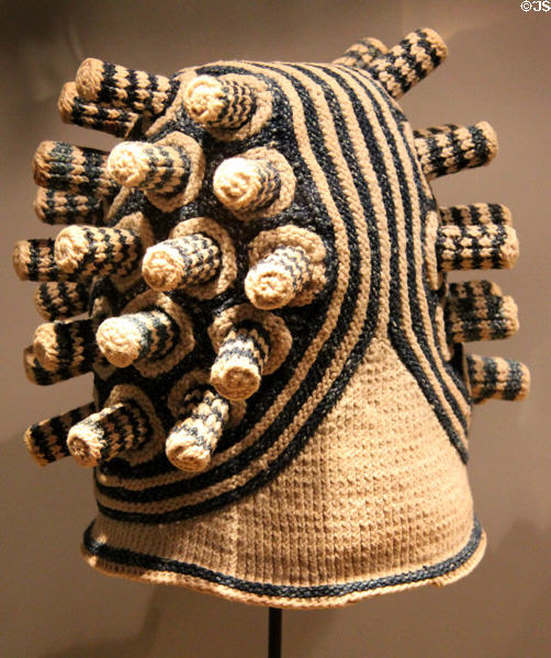 Woven knobbed hat (early 20thC) from Bamenda culture of Cameroon at Five Continents Museum. Munich, Germany.