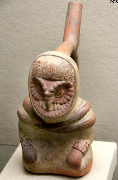 Moche culture ceramic stirrup vessel in shape of owl-like creature with human body (100 BCE- 600 CE) from north coast of Peru at Five Continents Museum. Munich, Germany.