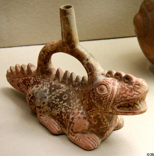 Moche culture ceramic stirrup vessel in shape of crocodile (100 BCE- 600 CE) from north coast of Peru at Five Continents Museum. Munich, Germany.
