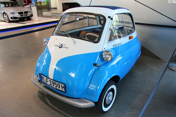 BMW Classic 250 Isetta (1959) entered by door across wider front at BMW World. Munich, Germany.