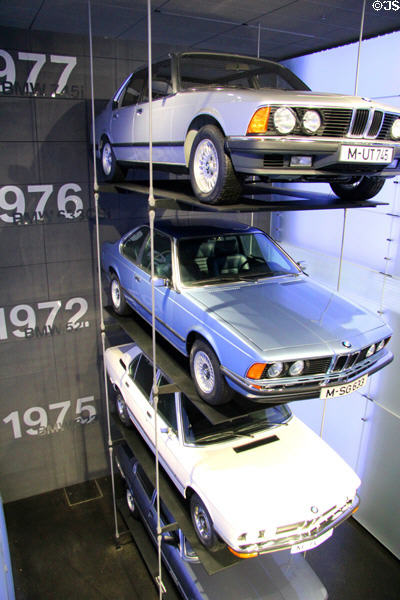Stack of evolving BMW sedan (1970s) at BMW Museum. Munich, Germany.