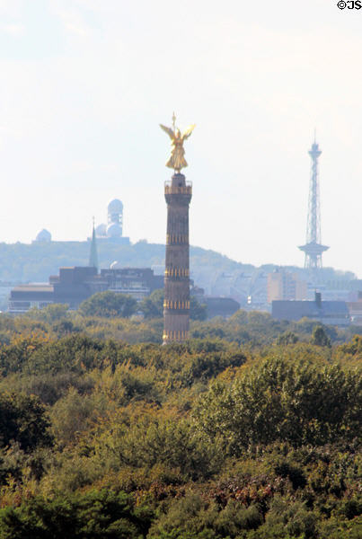 Siegessaule monument above Tiergarten Park forest from top of German Bundestag. Berlin, Germany.
