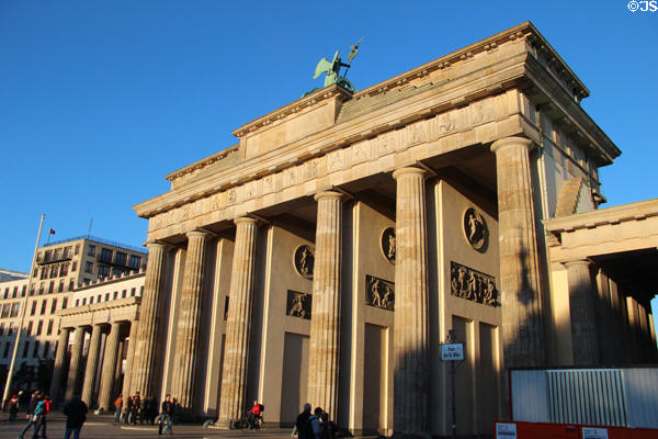 Brandenburg Gate seen obliquely showing carvings between columns. Berlin, Germany.