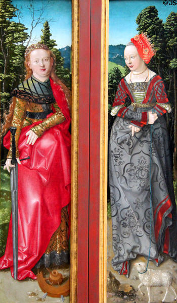 Wings of Three Kings altar with St Catherine & St Agnes painting (1506-7) by Hans Baldung Grien at Berlin Gemaldegalerie. Berlin, Germany.