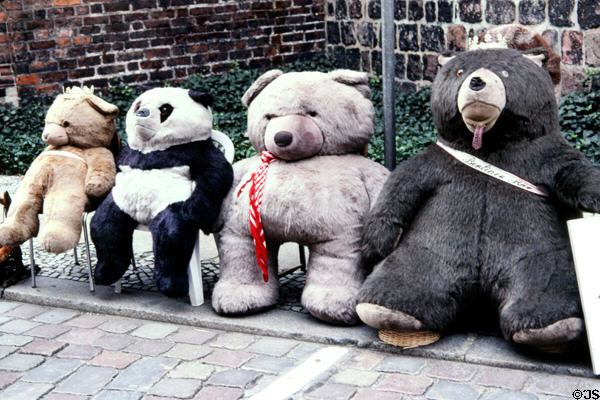 Stuffed plush bears on city sidewalk. Berlin, Germany.