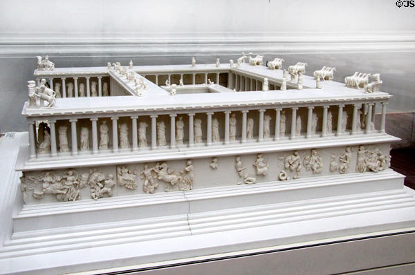 Scale model of Pergamon Acropolis altar with frieze around base now hung around walls of room holding altar at Pergamon Museum. Berlin, Germany.