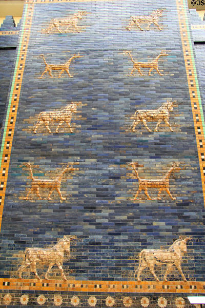 Ishtar Gate wall with alternating rows of dragons & auroch bulls reassembled from actual brick fragments & replica infill bricks at Pergamon Museum. Berlin, Germany.