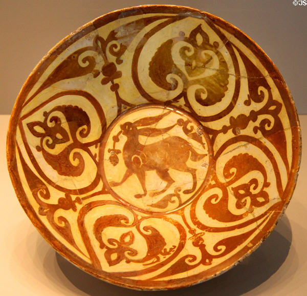 Earthenware dish painted with hare & palm fronds (10th-11thC) from Cairo, Egypt at Pergamon Museum. Berlin, Germany.