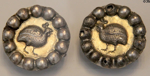 Partially gilded silver earrings in form of quail (7thC) from Iran at Pergamon Museum. Berlin, Germany.