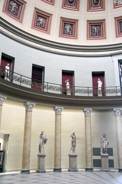 Sculptures of Greek gods & goddesses in domed hall at Altes Museum. Berlin, Germany.