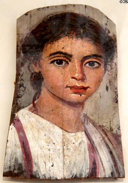 Mummy portrait of boy with curly hair from Fayum, Egypt (100-150 CE) at Altes Museum. Berlin, Germany.