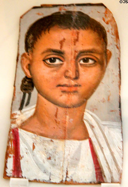 Mummy portrait of boy with curly hair from Fayum, Egypt (225-250 CE) at Altes Museum. Berlin, Germany.